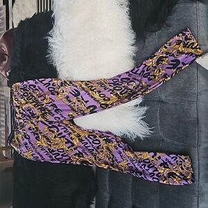 Versace leggings Pants purple  ( never worn) size 6 usa IT 42 NEW NO TAG
